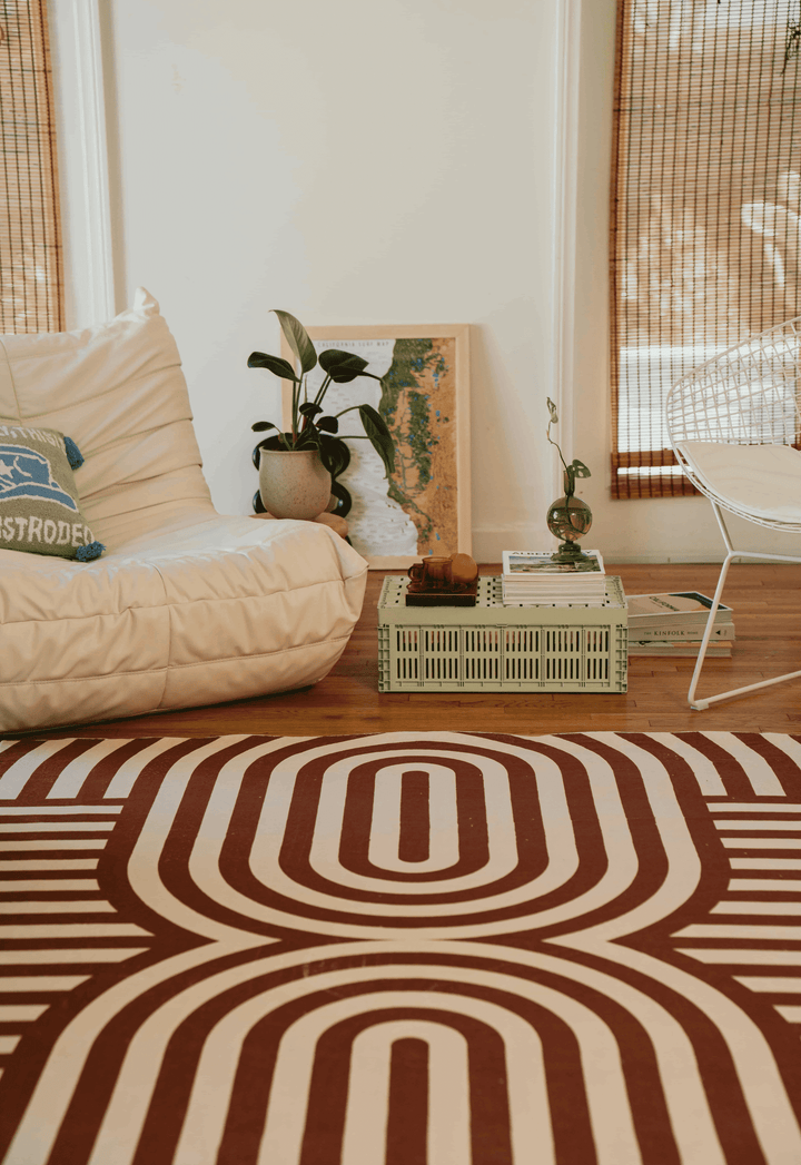 LanySpace Curvy Brown Stripes Design Rug next to Couch