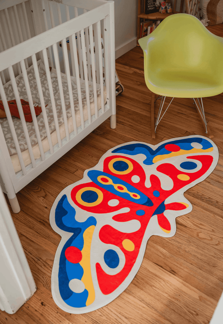 LanySpace Designer Irregular Butterfly Rug near a cradle