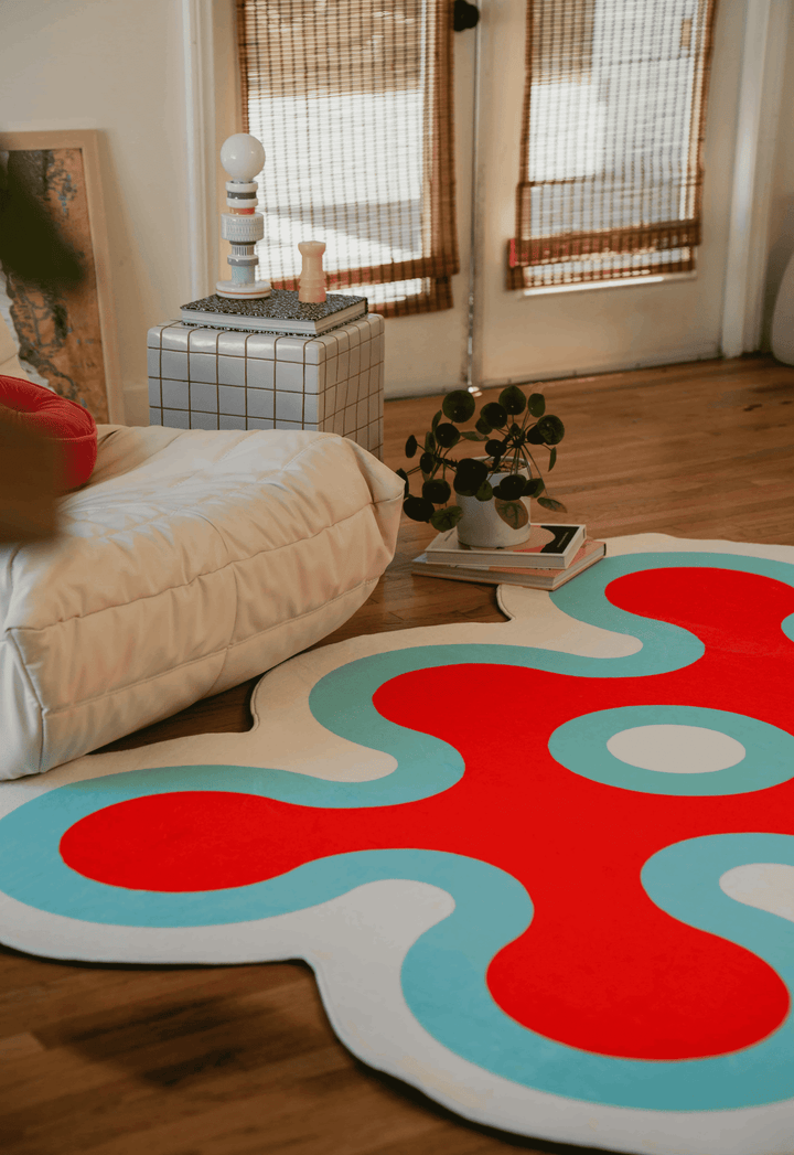 Closer look at LanySpace Irregular Coral Rug in Pink, before a couch