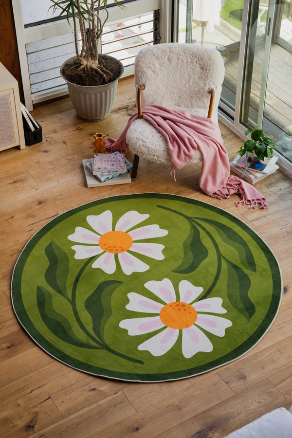 Lany Space x Jessica Miller Dual Daisy Green Round Rug, 6' x 6', in the living room