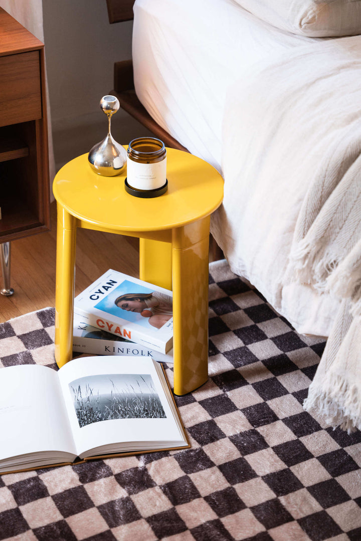 LanySpace Chocolate Brown Checkered Rug at the head of the bed