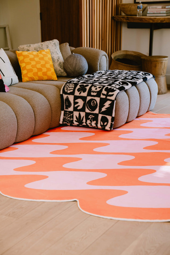 Cozy Corner with LanySpace Irregular Shaped Orange and Pink Wavy Rug