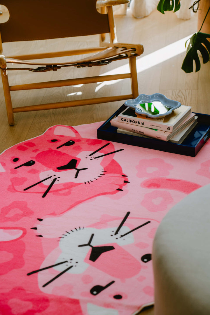 Cozy Reading on LanySpace Designer Irregular Pink Panther Rug